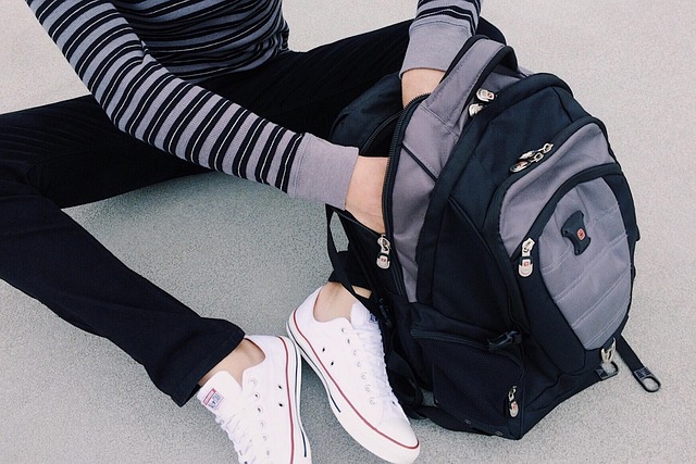 Future-conscious students carefully handling the bag
