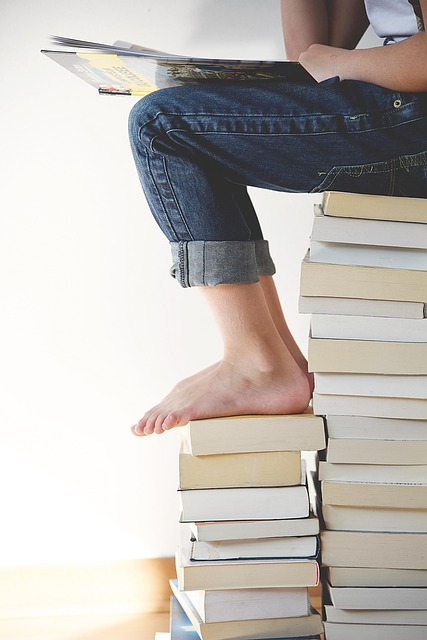 Is Your Child Running Away from Math? 5 Surefire Ways to Stop Palayan,Student sitting on math books in frustration