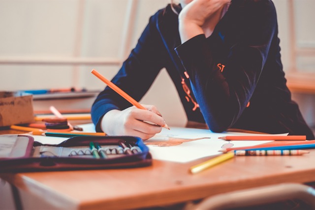 Is Your Child Running Away from Math? 5 Surefire Ways to Stop Palayan,Maths student solving questions on notebook