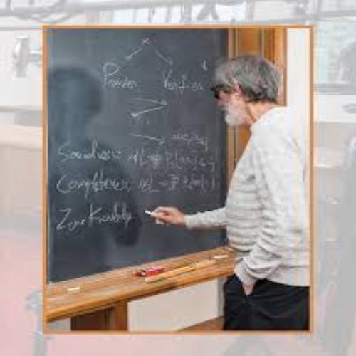 Mathematician Avi Wigderson explaining randomness on a blackboard at the Institute