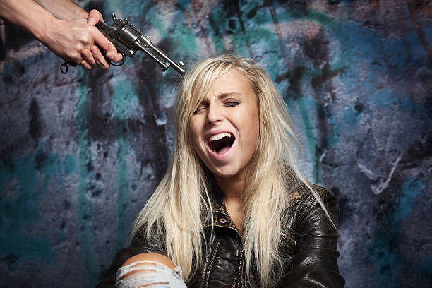 A stray young man pistol-to-man preparing a girl for intercourse