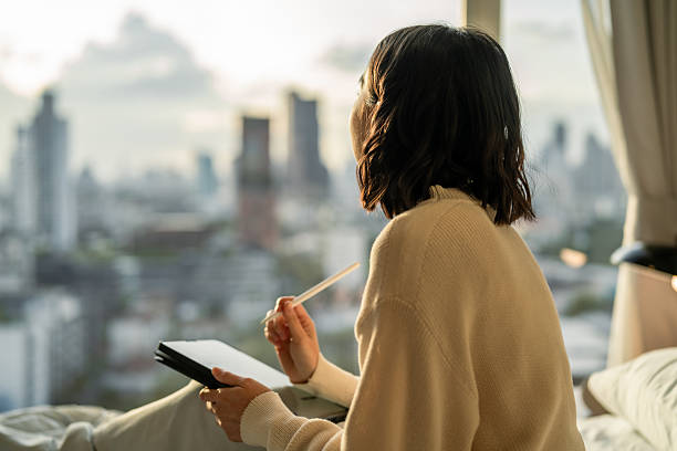 A female writer contemplating writing an article independently