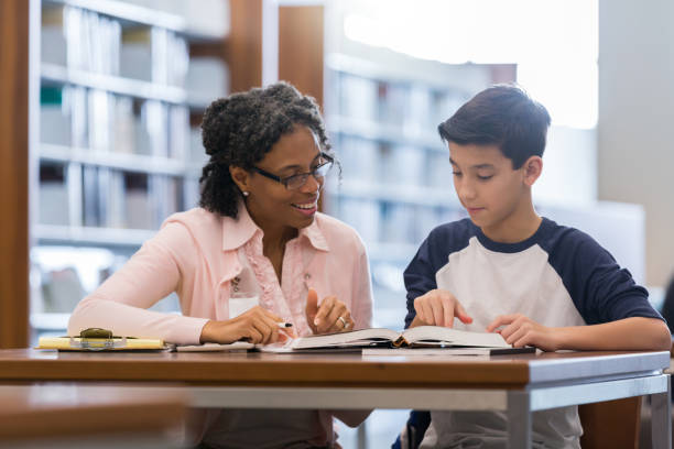 Female student and student solving math questions together