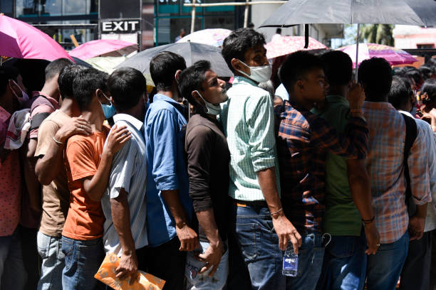 A huge crowd of desperate and frustrated educated unemployed lined up
