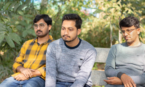 Frustrated from all sides,unemployed youths sitting in solitude