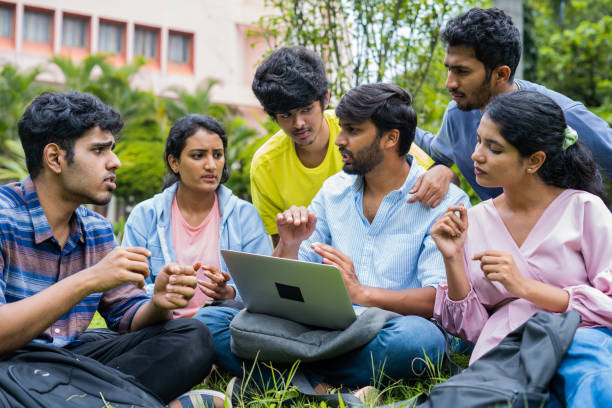 Students studying online from laptops in unison