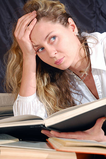 Girl Student Focusing on Book Study