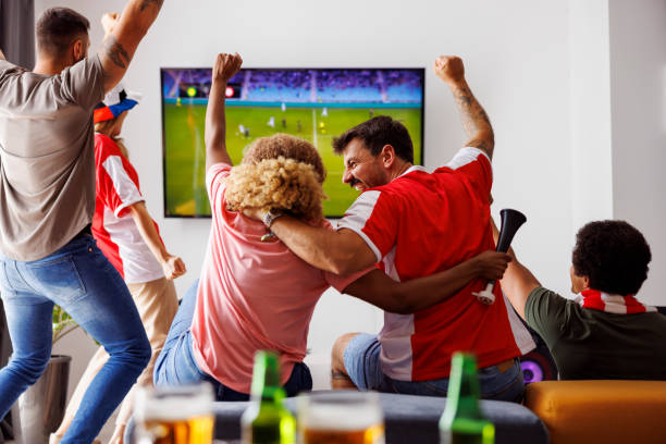 Youths expressing happiness after watching the program on TV