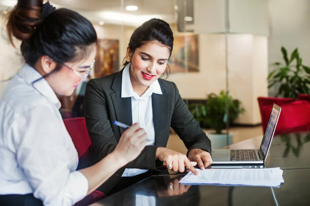 Two women discuss career growth