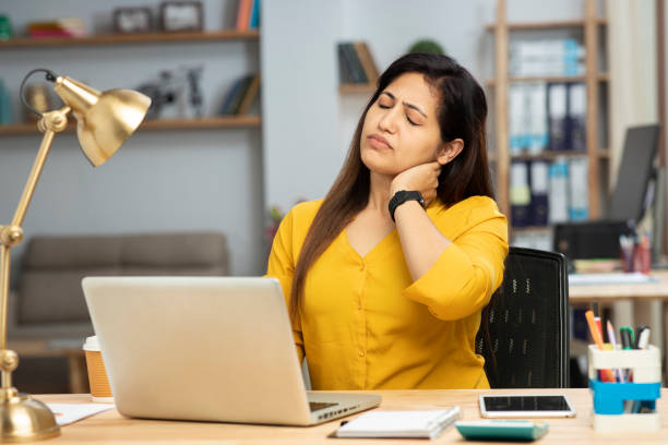 Female employee upset while settling jobs with laptop