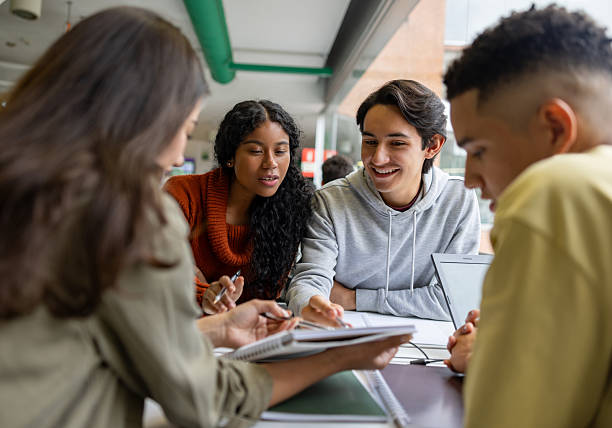 Students supporting each other in their studies in groups