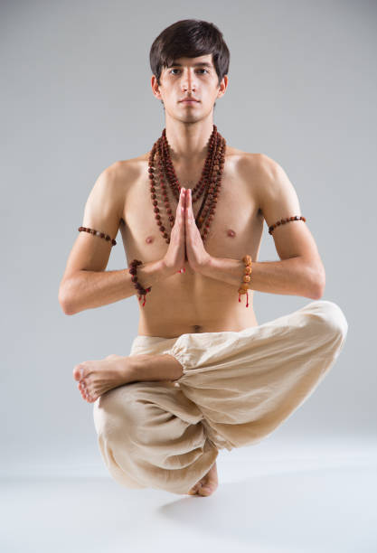 The young man is in a state of yoga to Live Like a Lighthouse