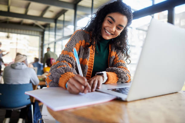 Girl student studying in a state of elation after learning the secret of the lighthouse