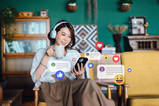 Female student using social platforms from mobile for career