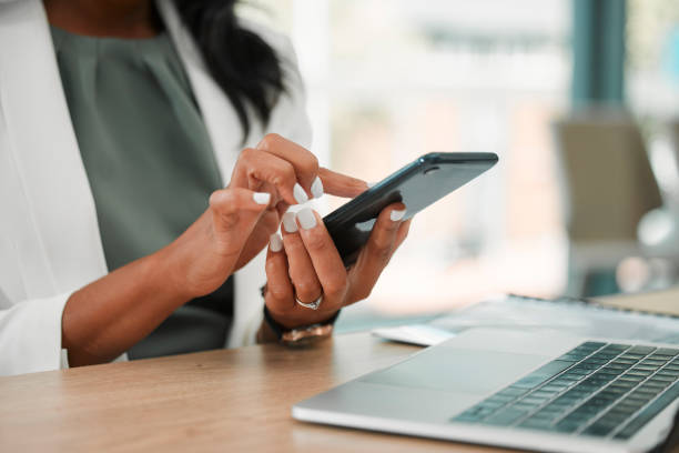 Female college student surfing the internet with her mobile