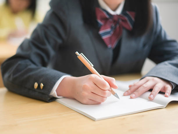 Female student studying with concentration