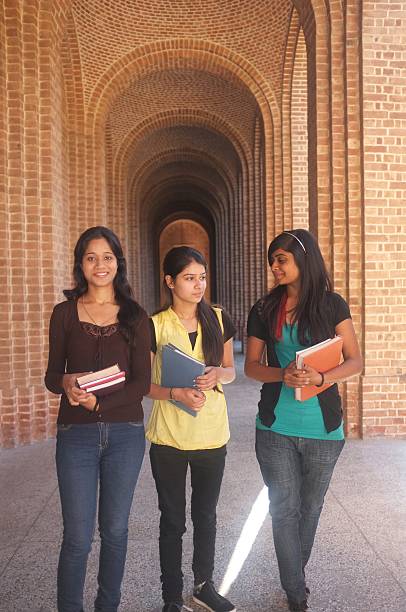 Female students coming out of coaching after preparing for competitive exams