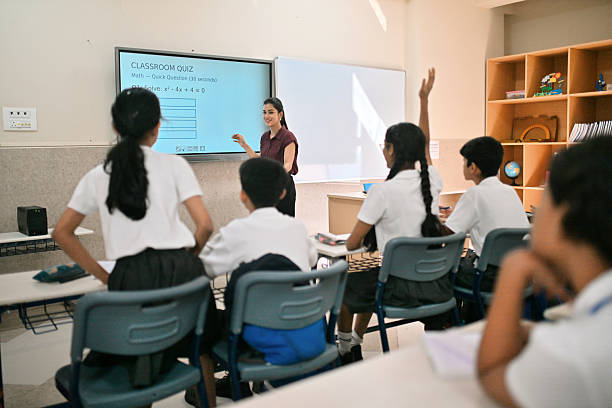 The teacher is upset with the student surfing social media and telling him