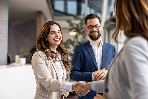Employees in business promising to follow ethical rules