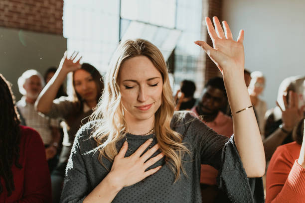 Christians standing and meditating on God