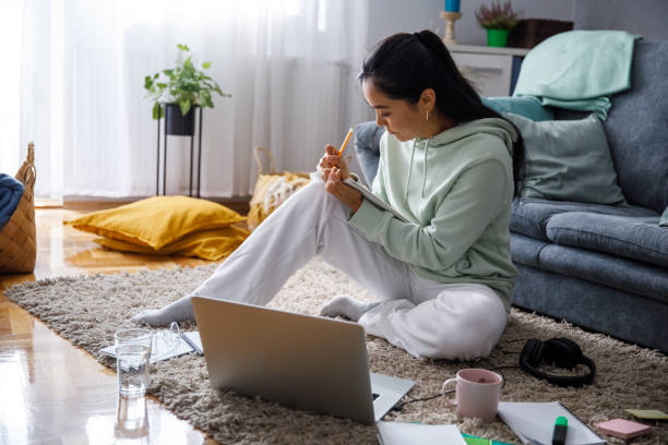 Girl student practicing writing essays