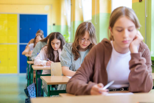 College students are taking the exam in the examination hall