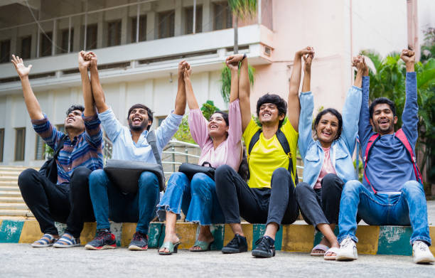 Students protesting with their hands raised to defend their rights