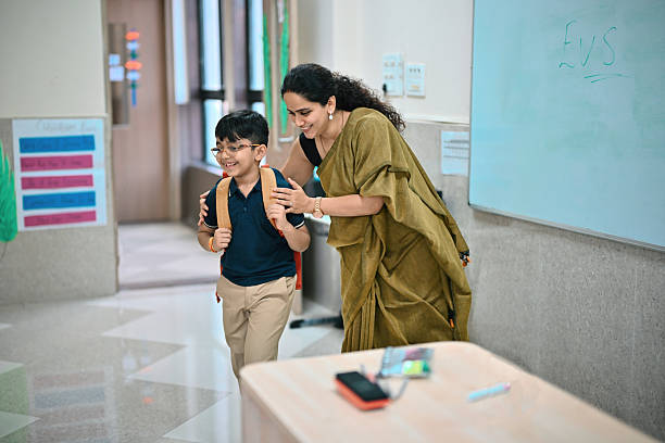 Teacher giving character education to a student in school