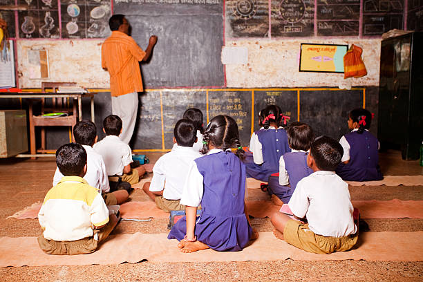 Maths teacher teaches young children