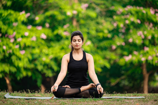 Woman meditating in solitude