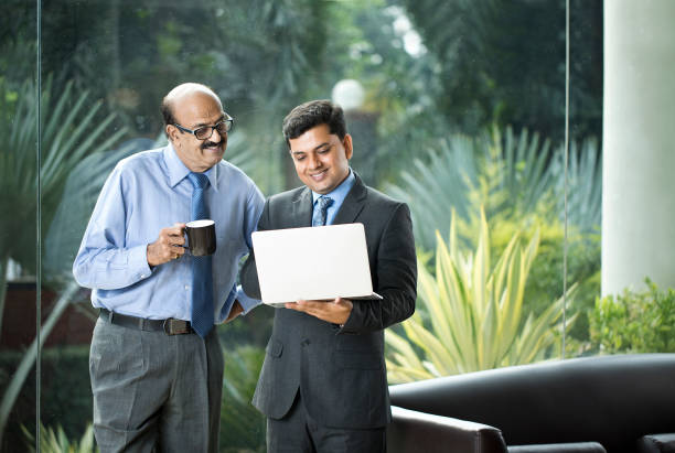 Describing the technology of business from a business laptop to a woman employee